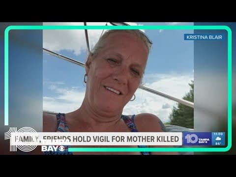 Family, friends hold vigil for mother killed, son remains suspect
