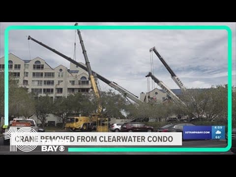 Construction crane removed from Feather Sound condo building after toppling over