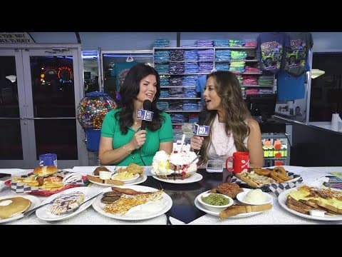 Abby Ham and Heather Waliga try a banana split at Mel's Diner in Pigeon Forge