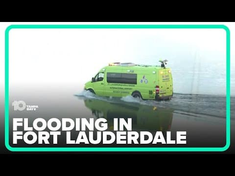 Fort Lauderdale airport emergency vehicle drives through flooded runway