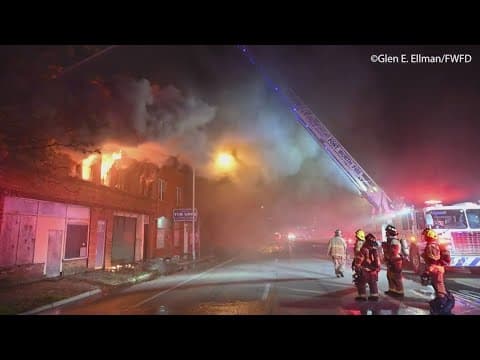 Fire burns in vacant building attached to notable chef's catering business, officials say