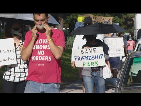 Advocates protest a potential wall replacement at Friendship Park