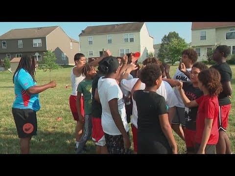 Pickerington youth football team practice with Ohio State Buckeyes after winning championship