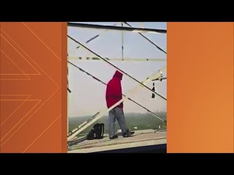 Man still atop radio tower at American University