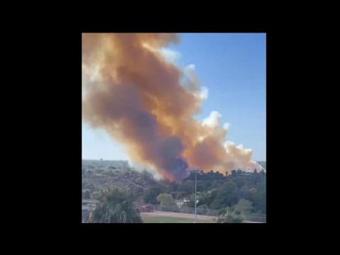 View of College Area fire atop San Diego State rooftop