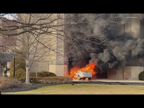 Car catches fire in front of north Indianapolis church