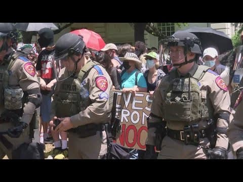Police in riot gear squaring off with protesters at UT-Austin
