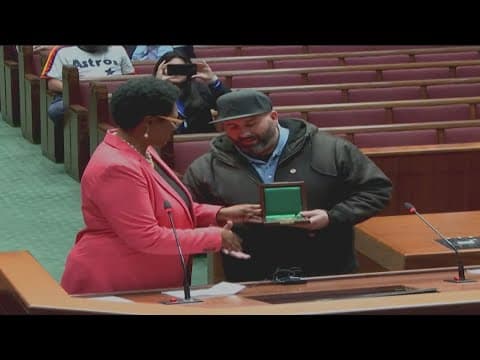 Houston driver who helped injured officer honored