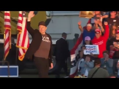 Elon Musk jumps around on stage as he joins Trump at rally