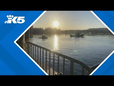 Man rescued after driving car off boat ramp