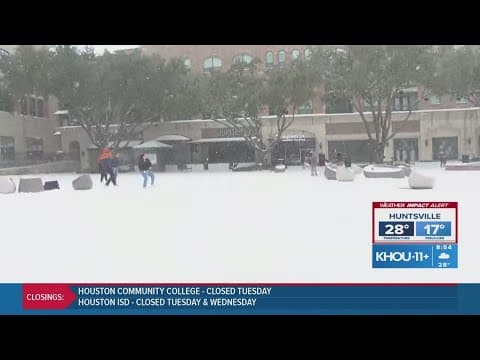 How much snow has fallen in the Sugar Land area?