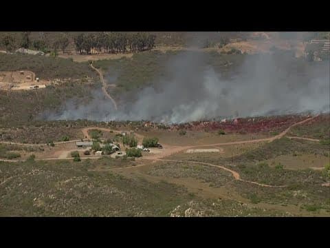 Fire crews extinguish brush fire in Poway, Highway 67 reopened