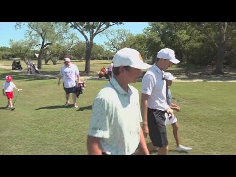 Jordan Spieth plays with young children at Brookhaven Country Club