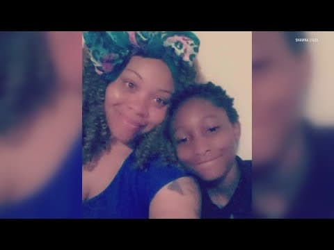 Child killed after being caught in crossfire