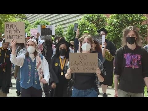 Large group of students walk out of graduation at Virginia Commonwealth University