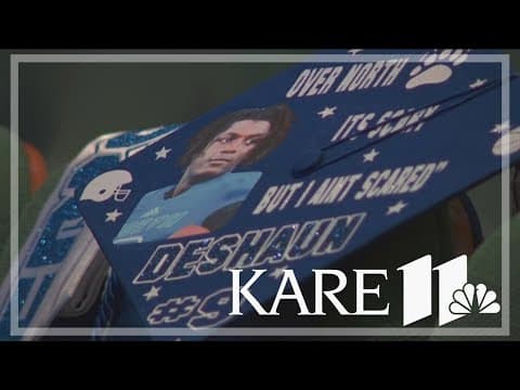 Deshaun Hill walks at North High graduation thanks to family