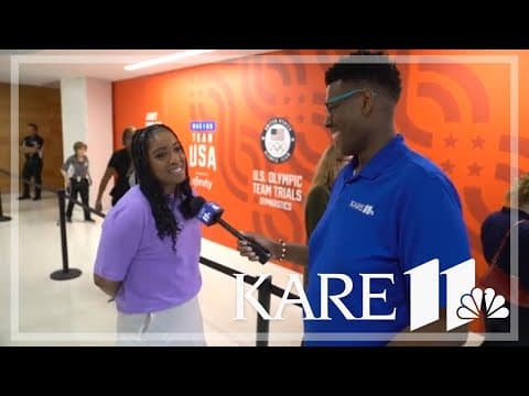 Reggie Wilson talks with NBC Olympic reporter Zora Stephenson