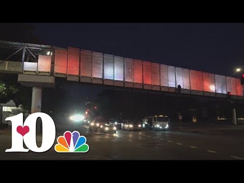 Pedestrian bridge turning orange showing support for the Vols in Omaha