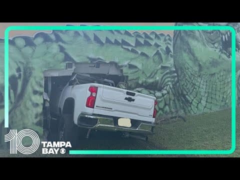 Truck goes through side of building in Winter Haven