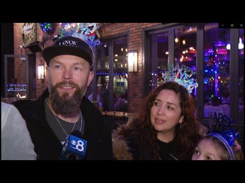 San Diegans celebrate a rainy New Year's Eve in the Gaslamp Quarter