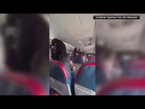 Delta flight makes emergency landing after passenger tries to open door mid-air