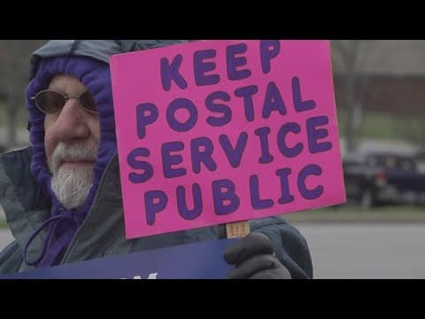 Postal workers rally against President Trump's USPS restructure