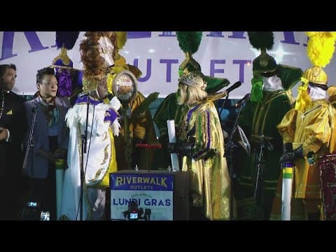 King Zulu and King of Rex exchange gifts