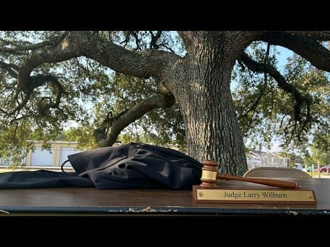 Taking it outside | Liberty County judge holding court under a big tree