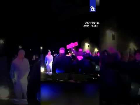 VIDEO: Crowd attacks police car in 'street takeover'