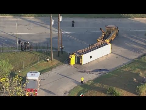 Multiple taken to hospital with minor injuries after crash flips school bus on side in SE Houston