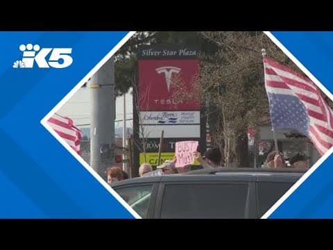 As Tesla reports drop in profits, Seattle protesters applaud