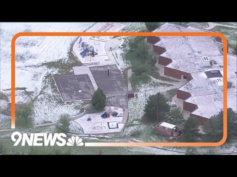 Hail covers fields after severe thunderstorm in Denver area