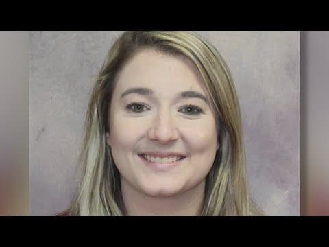 Texas high school cheer coach killed after being shot in the back by stray bullet, officials say