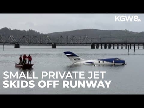 Small private jet skids off runway into water in North Bend; 5 people rescued