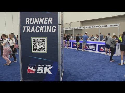 Runners getting ready at the Mini-Marathon expo ahead of race weekend