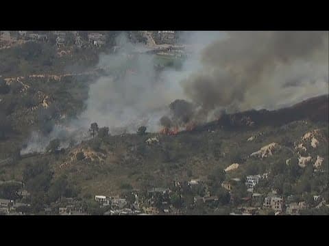 Brush fire burns in Del Mar