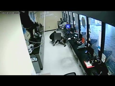 Thieves rob a business after dropping in from the ceiling