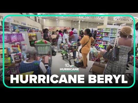 People in Jamaica stock up on supplies and water