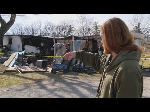Man rescues neighbor from burning home