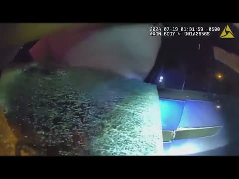 Body cam video captures officers rescuing a man from a burning car