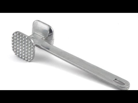 Woman charged in meat tenderizer attack