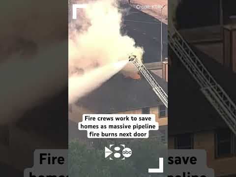 A huge pipeline fire was burning near Houston, destroying a park and forcing evacuations.