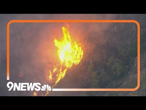 Aerial view of wildfire burning west of Golden