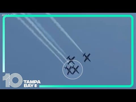 Two jets touch wings while flying in formation at Florida air show
