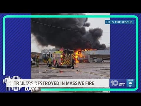 Multiple semi-trailers with downed power lines on them catch fire in Tampa, officials say