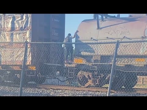 Students maneuvering over and under stopped trains in East End is a growing concern among residents
