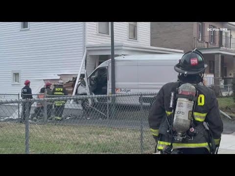 Delivery driver carjacked, rented van later found crashed into a house in Northeast DC