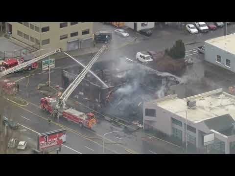 Aerials: Fire crews battle fire at vacant Lake City building