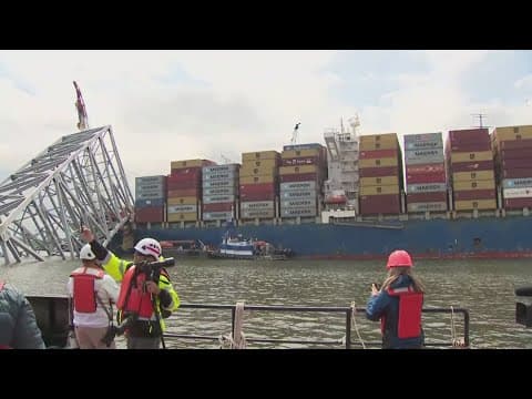 First cargo ship passes through newly opened channel in Baltimore