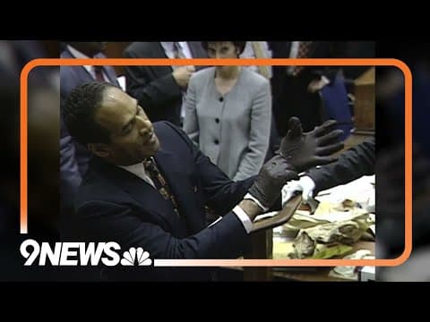 O.J. Simpson puts on gloves in court